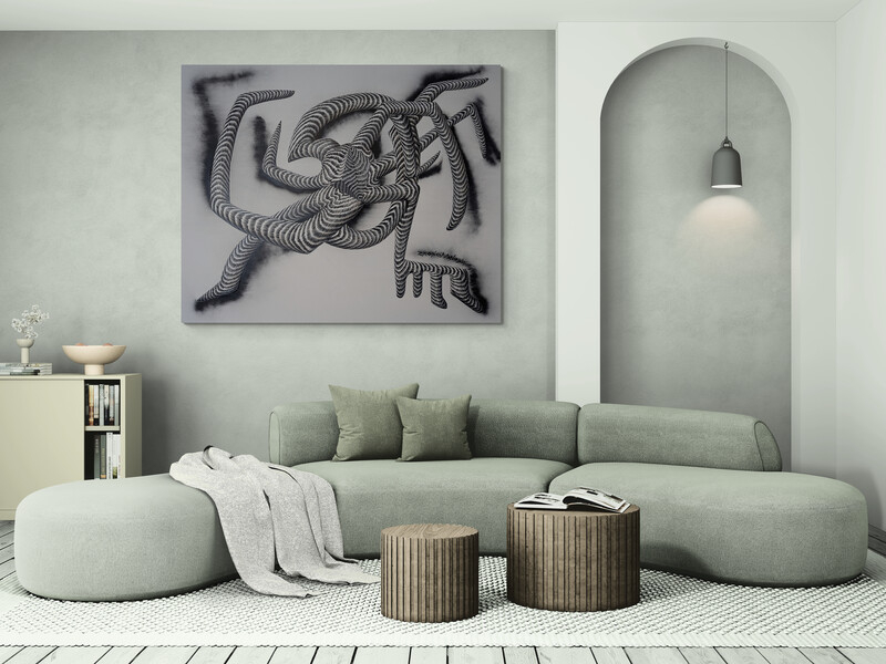 Original avant-garde painting displayed above a sage green sofa in a minimalist living room